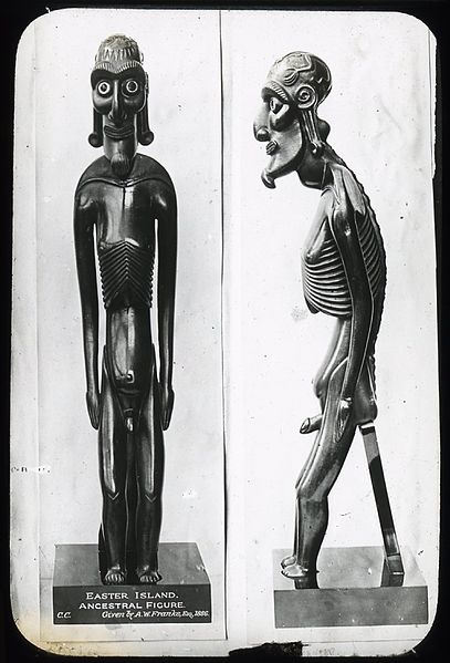 Front and side views of one wooden moai kavakava, historic museum photograph