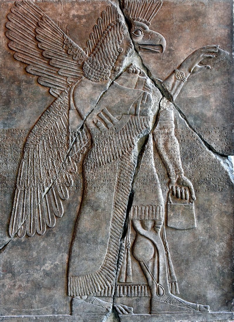 Eagle-headed apkallu with bucket and cone, Nimrud